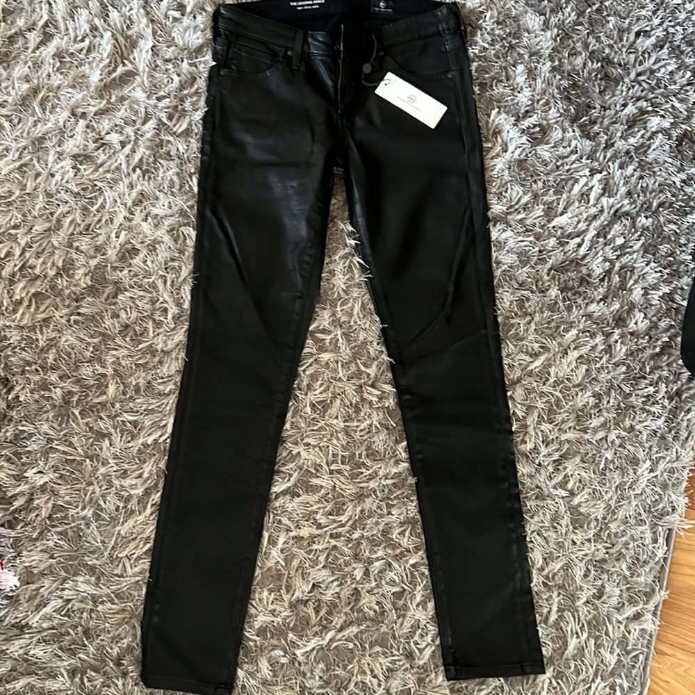 New with tags, never worn AG coated Jean (leather look)